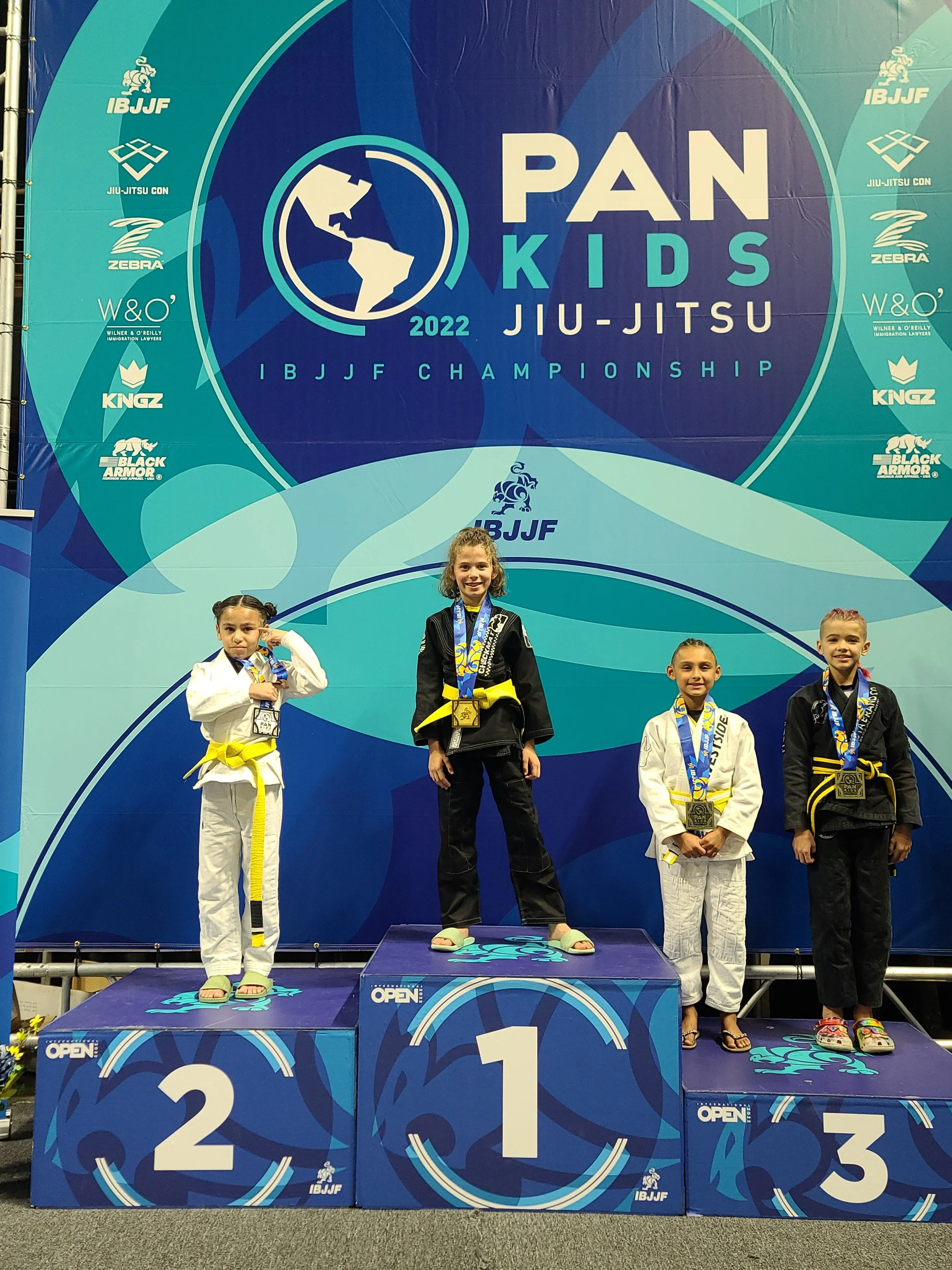 JM Modern students on the podium at an IBJJF Pan Kids championship